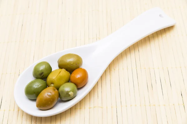 Olives in a spoon — Stock Photo, Image