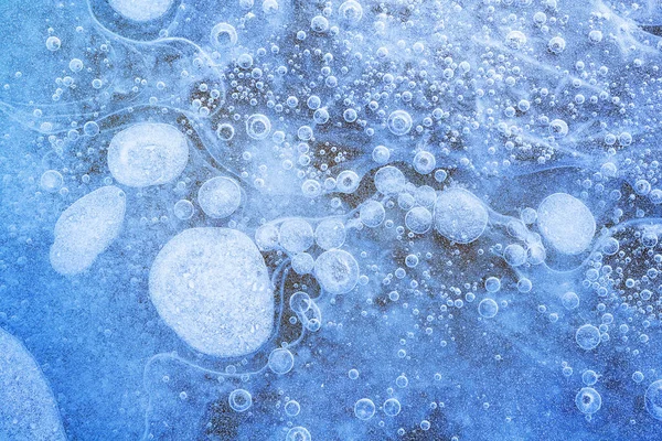 ミシガン州ミシガン湖の凍った表面の抽象的な氷のパターンのクローズアップ — ストック写真