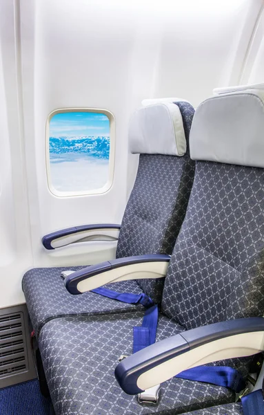 Empty aircraft seats and windows — Stock Photo, Image