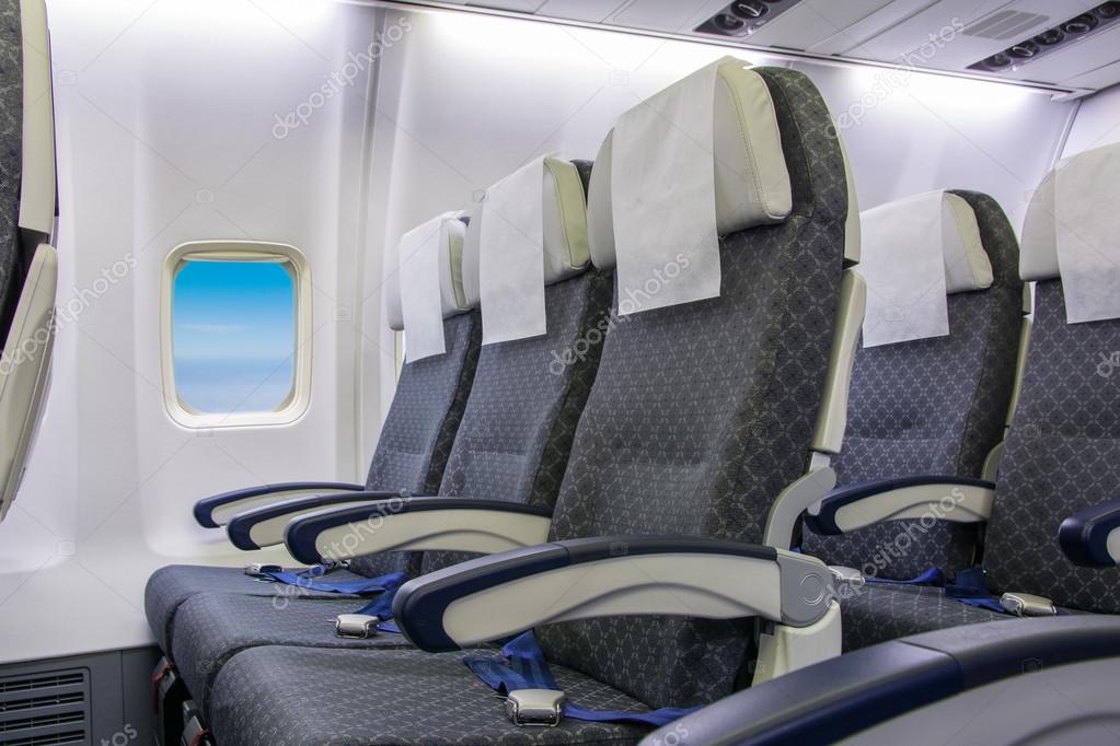 Boş uçak koltukları ve pencereleri Stok fotoğrafçılık ©brokenrecords