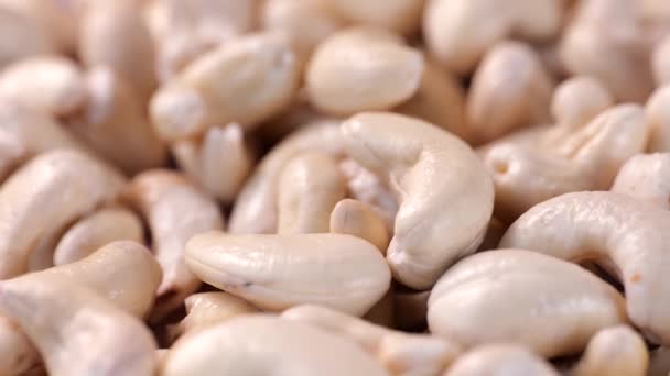 Närbild av roterande blötlagda cashewnötter hälsosam mat — Stockvideo