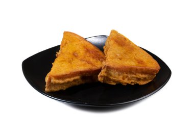 Hint usulü Kızarmış Ekmek Pakora ya da Bread Bhaji a Common Street Food, Ekmek Dilimleri, Gram unu ve Baharatlardan yapılır.