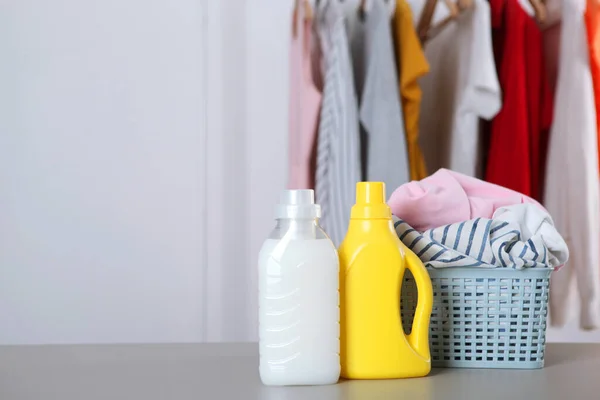 Laundry Detergent Bottles Clothes Table Household Chemicals High Quality Photo — Stock Photo, Image