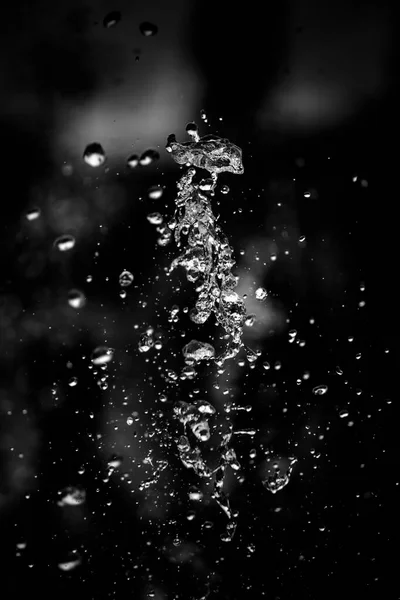 Брызги Жидкости Изолированном Черном Фоне — стоковое фото