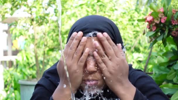 Woman Splashes Cold Water Her Face Hot Day Muslim Woman — Stock Video