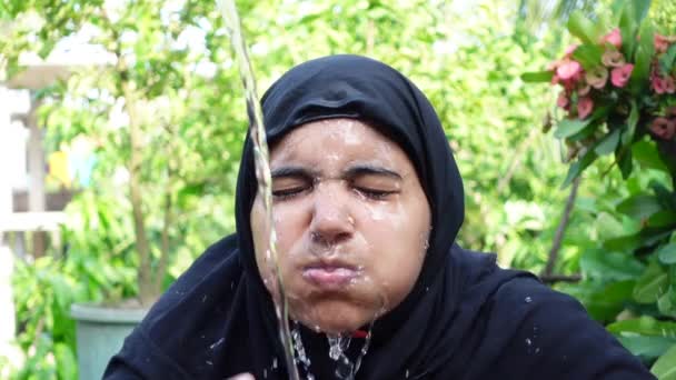 Woman Splashes Cold Water Her Face Hot Day Muslim Woman — Stock Video