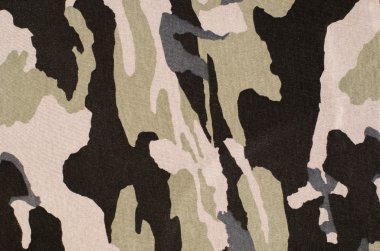 Kamuflaj desen kumaş üzerine.