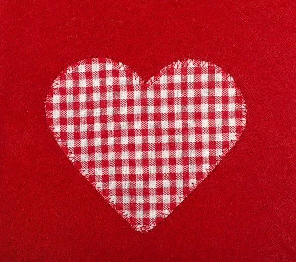Tvar srdce na červené vlny pozadí. — Stock fotografie