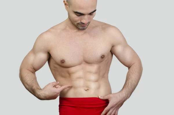 Man showing abs. — Stock Photo, Image