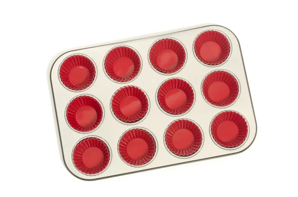 Bandeja de bolo com forros de silicone vermelho . — Fotografia de Stock