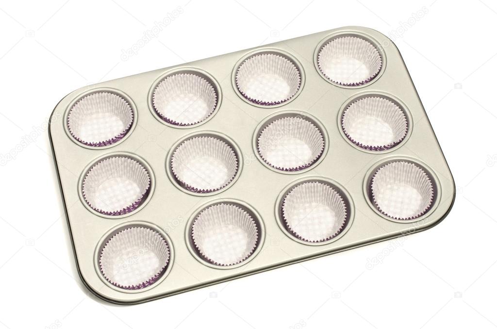 Cupcake tray with paper liners.