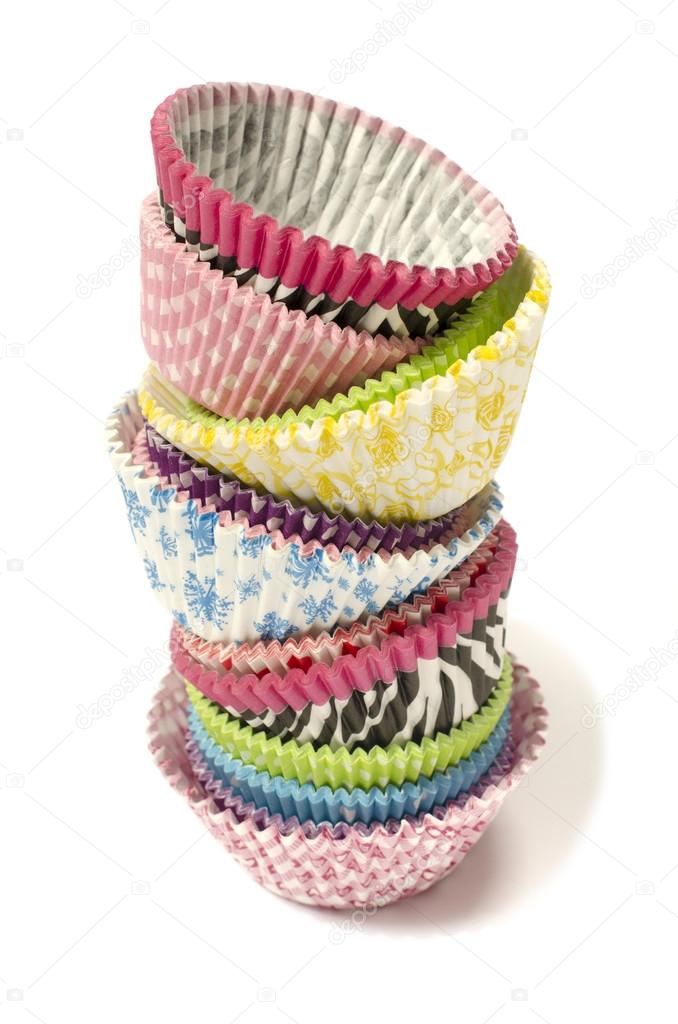 Pile of all colors cupcake paper cups. 