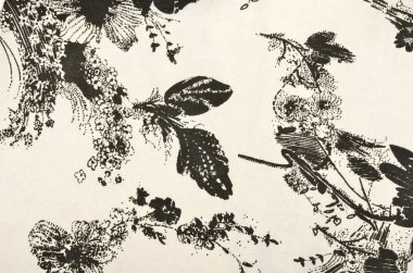 Grafik çiçek desenli kumaş üzerine.