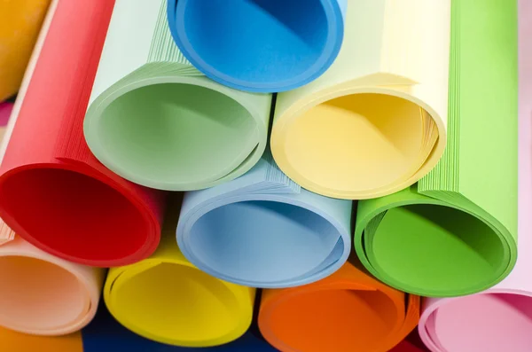 Color paper rolled and piled. — Stock Photo, Image