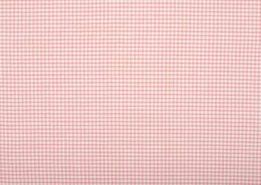 Damalı masa örtüsü kumaş üzerine yakın çekim.