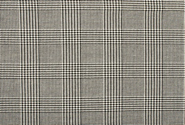 Schwarz-weißes Hufzahnmuster in Quadraten. — Stockfoto