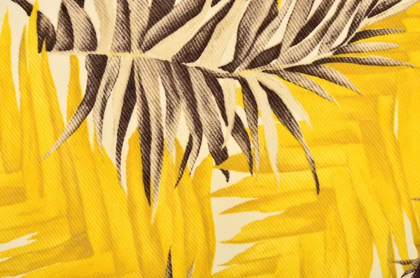 Modello di foglie tropicali marroni e gialle su tessuto . — Foto Stock