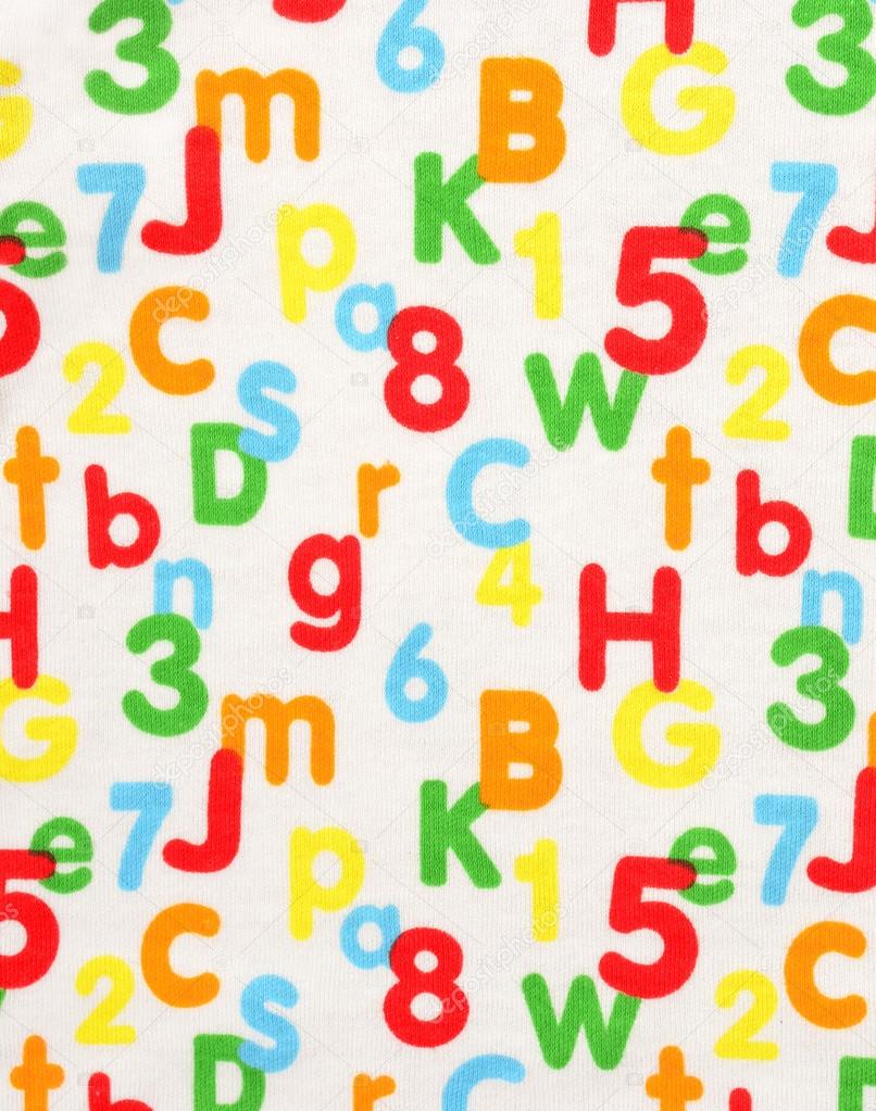 Numbers and letters on white fabric.