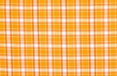 İskoç ekose deseni. Turuncu Beyaz ekose kumaş üzerine baskı ile.