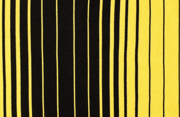 Listrado padrão têxtil preto e amarelo como fundo . — Fotografia de Stock