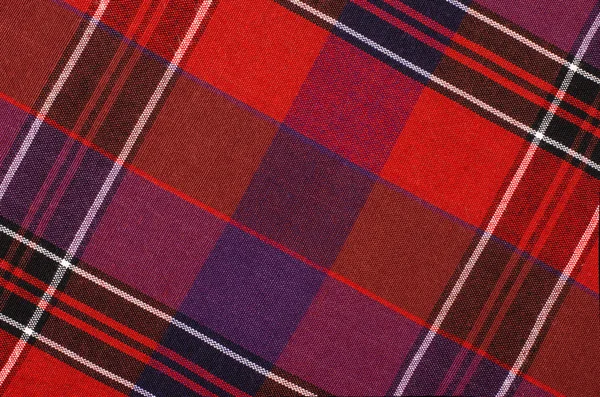 Scottish tartan pattern. Red and purple plaid print as background. — Stock Photo, Image