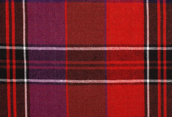 Scottish tartan pattern. Red and purple plaid print as background. — Stock Photo, Image