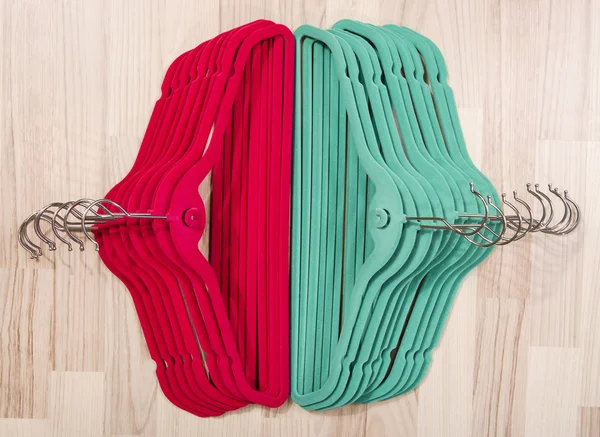 Pile of hangers nicely arranged on the floor. — Stock Photo, Image