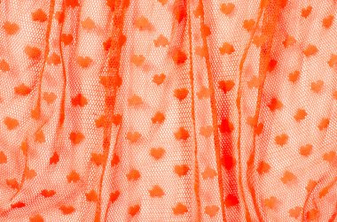 Turuncu pilili dantel yakın çekim.