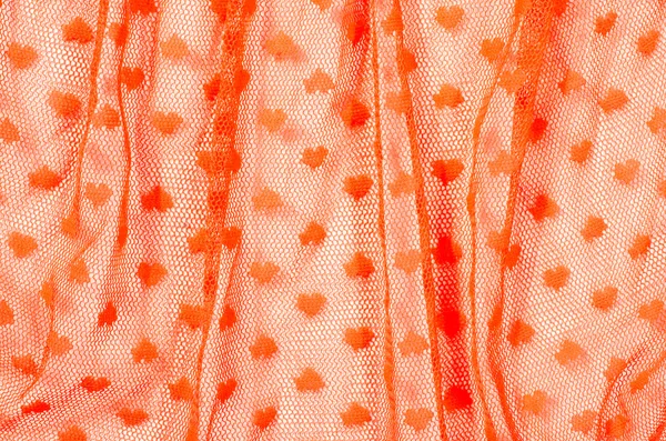 Turuncu pilili dantel yakın çekim.