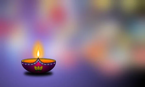 Happy Diwali Festival concept design with decorated clay lamp on blur lights colors background.