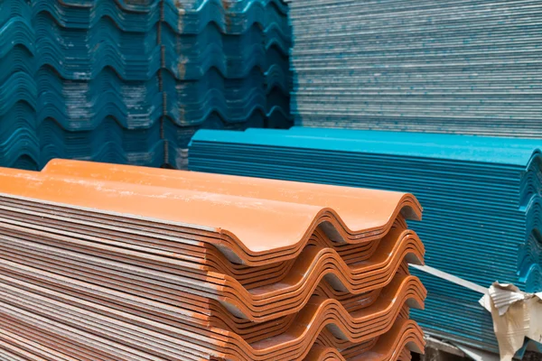 Stack of old roof tiles in warehouse — Stock Photo, Image