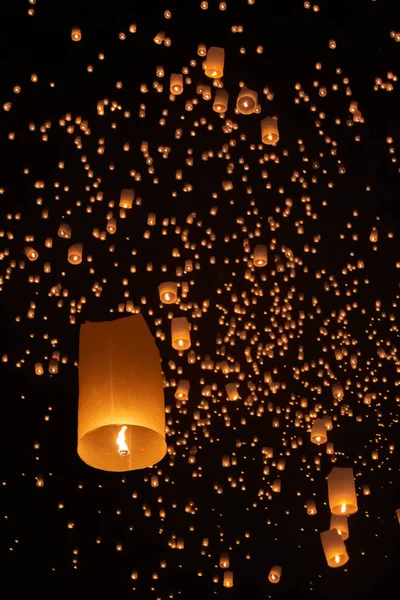 Tourist floating sky lanterns in Loy Krathong festival , Chiang Mai ,Thailand.