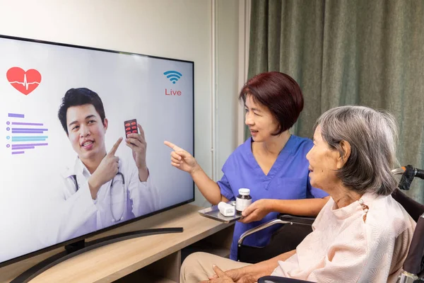 Elderly woman meet online doctor to consultant about health.