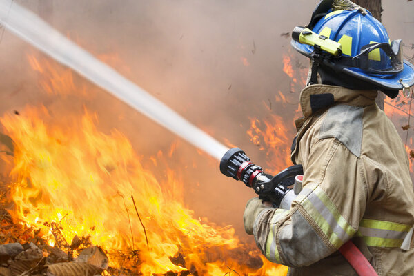 firefighters battle a wildfire