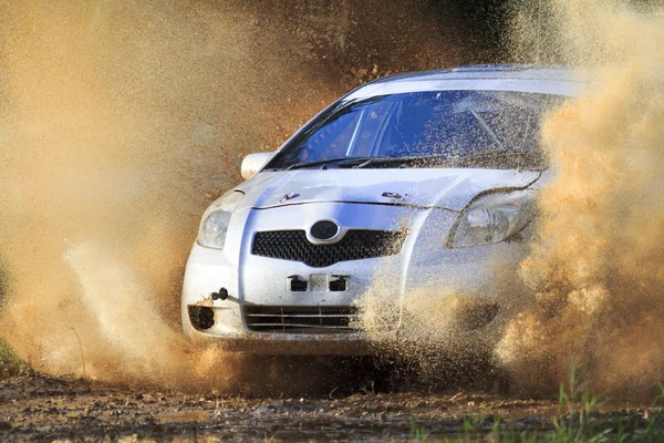 Rally car splashing the water — Stock Photo, Image