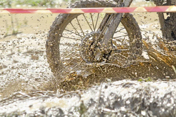 Motocross accelerating speed in mud — Stock Photo, Image