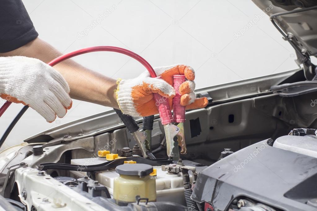 Hand of auto mechanic. Car repair service.