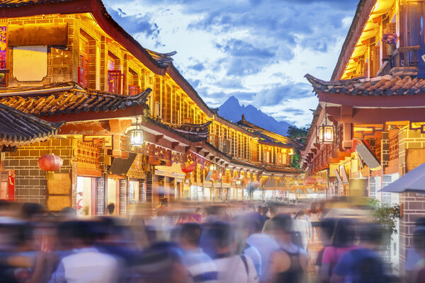 Lijiang old town in the evening with crowded tourist , Yunnan China.