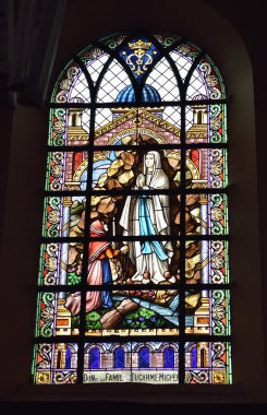 Stained glass window in Saint-Martin Church clipart