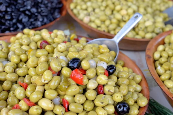 Different kinds of marinated olives