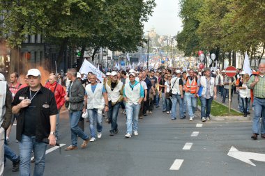 Belgian Police and trade-unions demonstrate against changes in pension regulations clipart