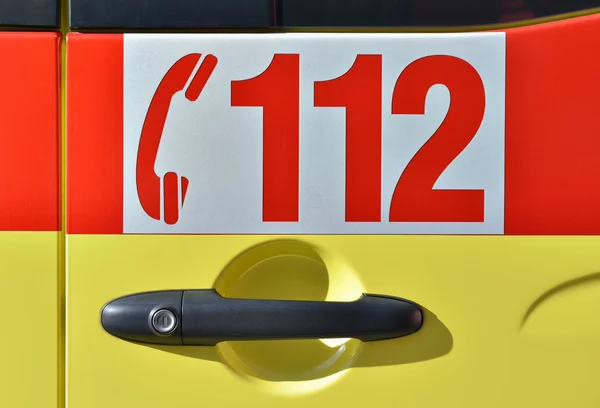 Door of vehicle with European Emergency Number 112 — Stock Photo, Image