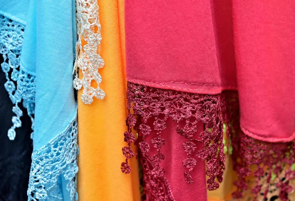 Colorful scarves on village market — Stock Photo, Image