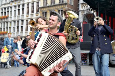activities on Grand Place after ceremony of award of costume to Manneken Pis