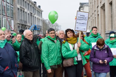 Protests against decision of Delhaize supermarket to fire many employees. Brussels