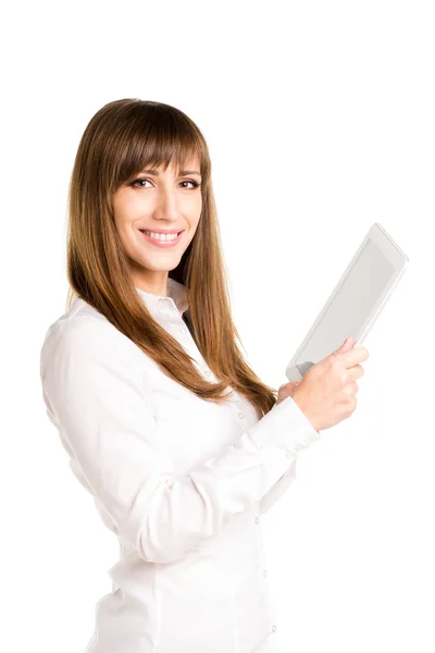 Young smiling business woman using tablet computer — Stock Photo, Image