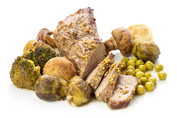 Roast beef with vegetables on white background — Stock Image Roast beef with vegetables on white background Stock Image