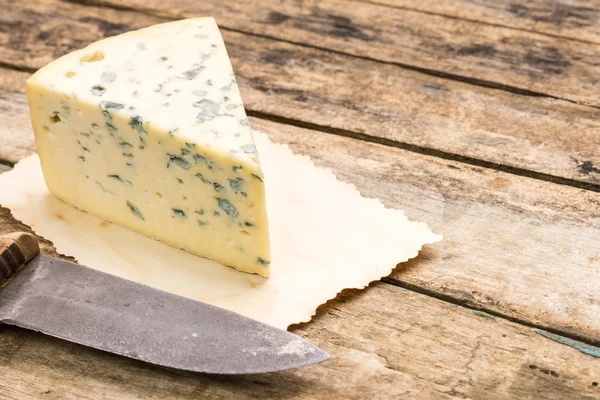 Blue cheese background with copyspace. — Stock Photo, Image