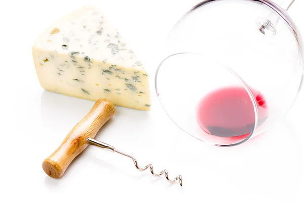 Piece of blue cheese with wineglass — Stock Photo, Image