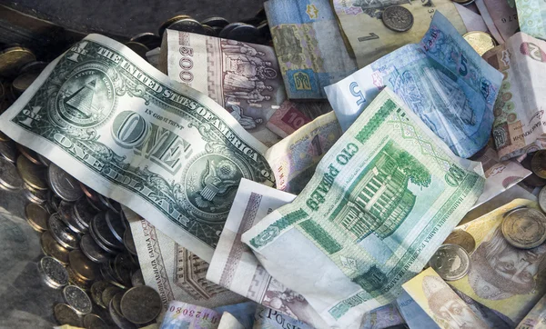 Buitenlands geld collage achtergrond. Bankbiljetten van verschillende landen — Stockfoto